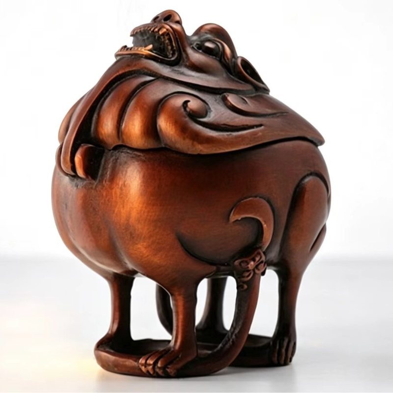 Brass censer surmounted by a wangtianhou beast, tripod base
