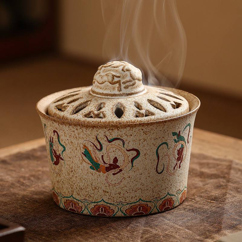 Ceramic censer with a Dunhuang flying-apsara motif, on a rosewood stand