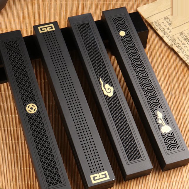 Purple bamboo lying-incense holder, carved openwork lid, shallow incense bed